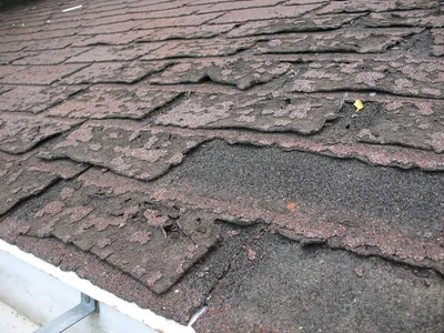 Aging and damaged roof shingles