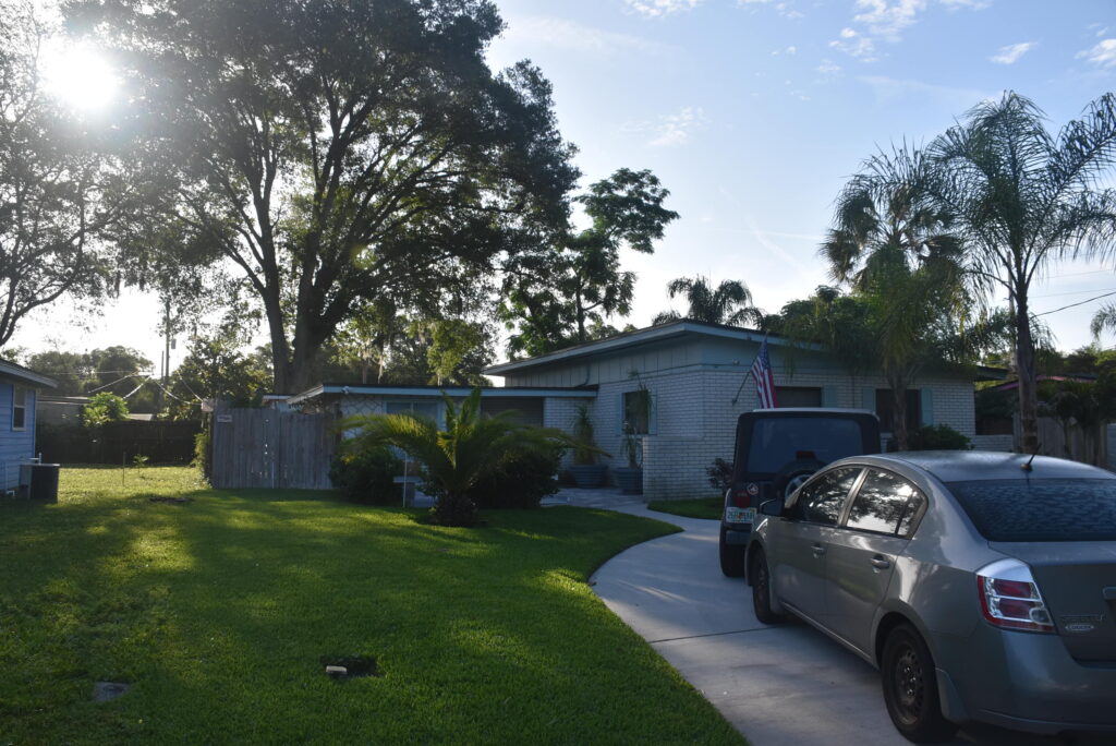 Home with emergency replacment asphalt shingle roof from Aj Wells roofing and construction